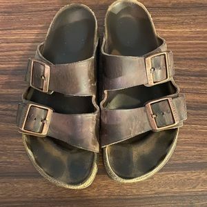 Birkenstock’s are worn in but still have a lot of life in them.